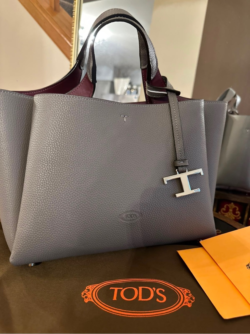 Tod's Gray Pebbled Leather Tote with Silver T Charm and Burgundy Trim
